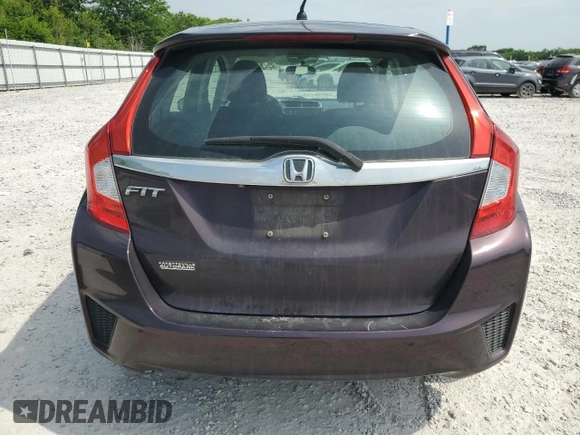 2015 Honda Fit EX-L z VIN 3HGGK5H8XFM777535, wystawiony jako Copart lot #59304185 z przebiegiem 106 393 mil mil oraz Szkoda całkowita • Salvage title. Historia ofert i sprzedaży dostępna na DreamBid. Obrazek 6.