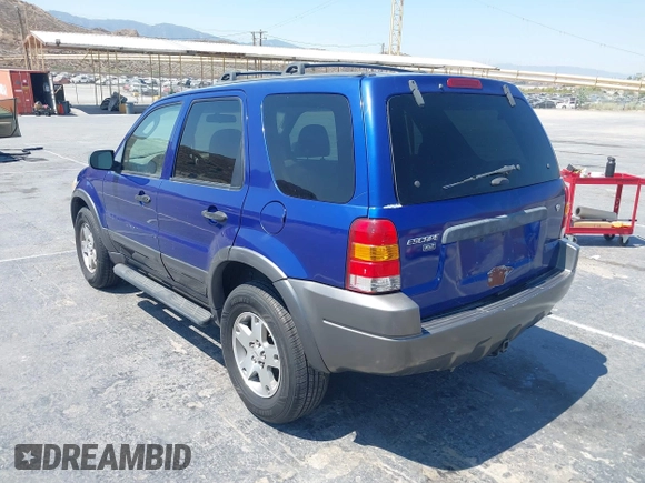 2005 Ford Escape XLT with VIN 1FMYU03155KB63374, listed as a IAAI auction lot 42739496 with 128,768 mi miles and . Bid and sale history available at DreamBid. Image 3.