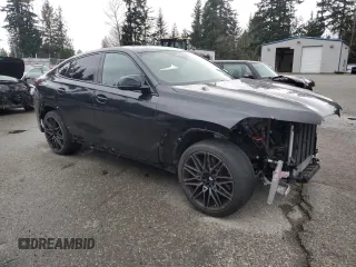 2024 BMW X6 M with VIN 5YM23ET08R9V15689, listed as a Copart auction lot 86357404 with 9,847 mi miles and Salvage Title. Bid and sale history available at carsss.com. Image 4.