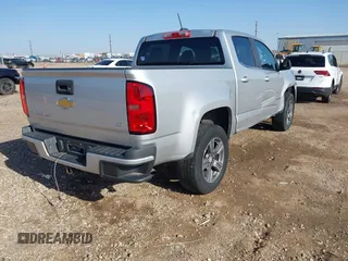 2018 Chevrolet Colorado 2WD LT z VIN 1GCGSCEN5J1300840, wystawiony jako IAAI lot #41997279 z przebiegiem 75 705 mil mil oraz . Historia ofert i sprzedaży dostępna na DreamBid. Obrazek 4.
