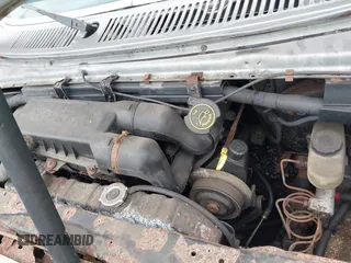 1990 Ford Econoline Cargo z VIN 1FTDE14Y4LHA18080, wystawiony jako IAAI lot #42324693 z przebiegiem Nie podano mil oraz . Historia ofert i sprzedaży dostępna na DreamBid. Obrazek 10.