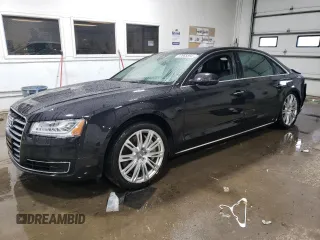 2015 Audi A8 4.0T with VIN WAU32AFD0FN017865, listed as a Copart auction lot 37065594 with 55,632 mi miles and Salvage title. Bid and sale history available at DreamBid. Image 1.