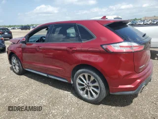 2019 Ford Edge ST z VIN 2FMPK4AP7KBC21121, wystawiony jako Copart lot #50997995 z przebiegiem 101 795 mil mil oraz Czysty tytuł • Clean title. Historia ofert i sprzedaży dostępna na DreamBid. Obrazek 2.