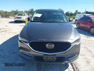 2018 Mazda CX-5 Grand Touring with VIN JM3KFBDM8J0314925, listed as a IAAI auction lot 41825917 with 70,027 mi miles. Bid and sale history available at carsss.com. Image 13.