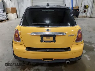 2009 MINI Hardtop z VIN WMWMF33549TU70310, wystawiony jako Copart lot #57797815 z przebiegiem 136 843 mil mil oraz Szkody całkowita. Historia ofert i sprzedaży dostępna na DreamBid. Obrazek 6.