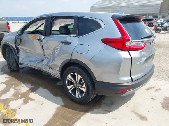 2017 Honda CR-V LX with VIN 7FARW5H38HE014201, listed as a IAAI auction lot 42044460 with 82,174 mi miles. Bid and sale history available at carsss.com. Image 3.