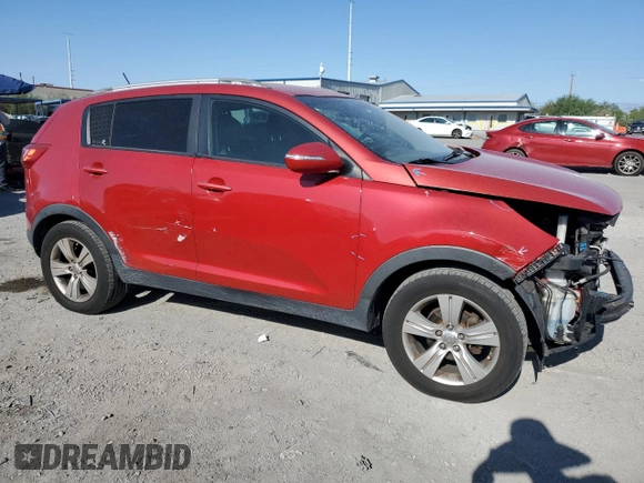 2011 Kia Sportage with VIN KNDPB3A23B7117933, listed as a Copart auction lot 59360025 with 196,779 mi miles and Salvage title. Bid and sale history available at DreamBid. Image 4.