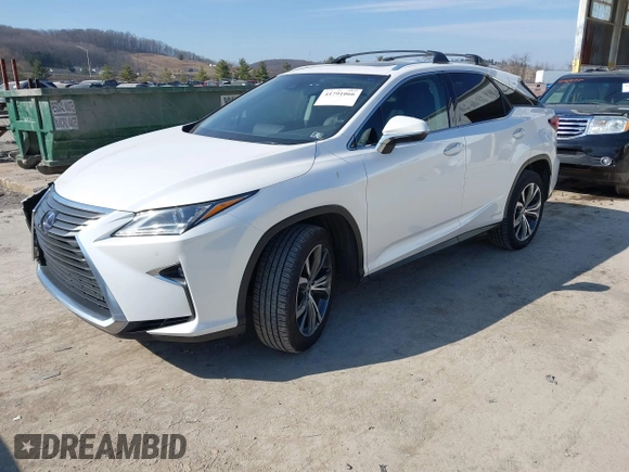 2016 Lexus RX 450h with VIN 2T2BGMCAXGC004844, listed as a IAAI auction lot 41791066 with 100,604 mi miles and . Bid and sale history available at DreamBid. Image 2.