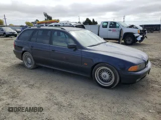 2000 BMW 5 Series 528iAt with VIN WBADP634XYBV64797, listed as a Copart auction lot 71316904 with 163,267 mi miles and Salvage Title. Bid and sale history available at carsss.com. Image 4.