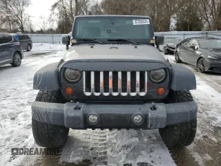 2011 Jeep Wrangler Rubicon with VIN 1J4BA6D1XBL556808, listed as a Copart auction lot 87358534 with 196,139 mi miles and Clean Title. Bid and sale history available at carsss.com. Image 5.