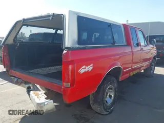 1996 Ford F-150 with VIN 1FTEX14N4TKA35971, listed as a IAAI auction lot 41744323 with 187,572 mi miles. Bid and sale history available at carsss.com. Image 4.