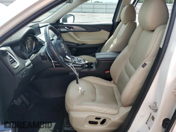 2019 Mazda CX-9 Touring z VIN JM3TCBCY9K0305038, wystawiony jako Copart lot #56707735 z przebiegiem 76 546 mil mil oraz Szkoda całkowita • Salvage title. Historia ofert i sprzedaży dostępna na DreamBid. Obrazek 7.