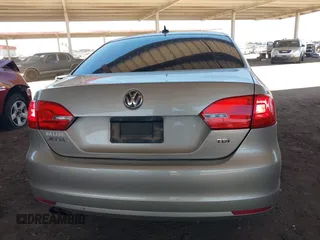 2014 Volkswagen Jetta TDI w/Premium with VIN 3VWLL7AJ1EM228062, listed as a IAAI auction lot 42256650 with 218,955 mi miles and . Bid and sale history available at DreamBid. Image 16.