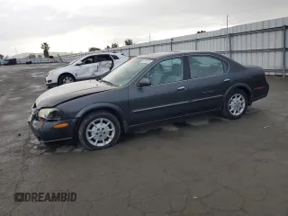2000 Nissan Maxima GXE z VIN JN1CA31D1YT556246, wystawiony jako Copart lot #51316775 z przebiegiem 178 505 mil mil oraz Szkoda całkowita • Salvage title. Historia ofert i sprzedaży dostępna na DreamBid. Obrazek 1.