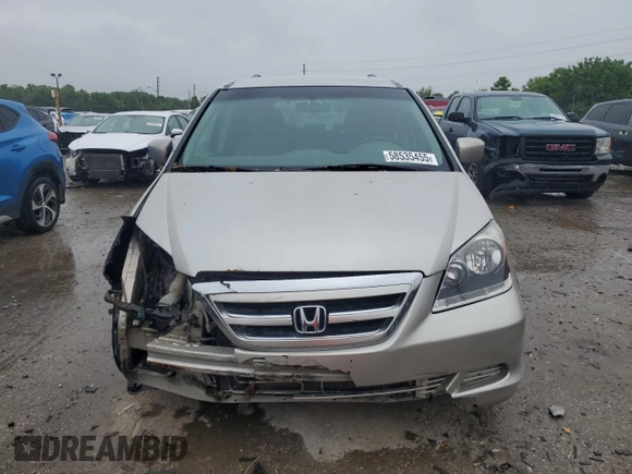 2005 Honda Odyssey EX with VIN 5FNRL38415B410659, listed as a Copart auction lot 58535455 with 198,250 mi miles and Salvage title. Bid and sale history available at DreamBid. Image 5.