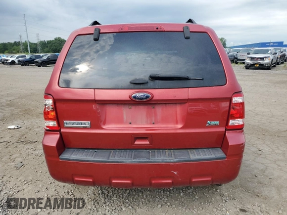 2012 Ford Escape XLT z VIN 1FMCU9DG8CKA63185, wystawiony jako Copart lot #64133205 z przebiegiem 161 024 mil mil oraz Czysty tytuł • Clean title. Historia ofert i sprzedaży dostępna na DreamBid. Obrazek 6.