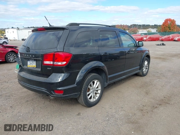 2013 Dodge Journey SXT with VIN 3C4PDDBG7DT553130, listed as a IAAI auction lot 40570369 with Not Provided miles and . Bid and sale history available at DreamBid. Image 4.