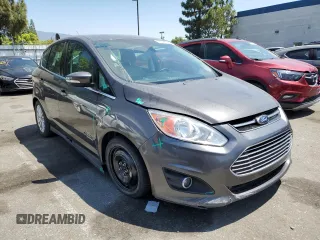 2015 Ford C-Max Energi SEL with VIN 1FADP5CU4FL118686, listed as a Copart auction lot 65058334 with 98,829 mi miles and Salvage Title. Bid and sale history available at carsss.com. Image 4.