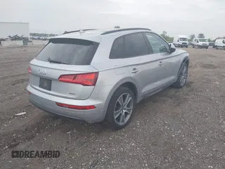 2019 Audi Q5 Premium Plus z VIN WA1BNAFY4K2073225, wystawiony jako IAAI lot #42458236 z przebiegiem 104 706 mil mil oraz . Historia ofert i sprzedaży dostępna na DreamBid. Obrazek 4.
