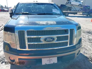 2011 Ford F-150 Lariat with VIN 1FTFW1E64BFA33904, listed as a IAAI auction lot 41665400 with 122,139 mi miles. Bid and sale history available at carsss.com. Image 13.