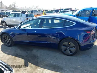 2018 Tesla Model 3 Long Range Battery z VIN 5YJ3E1EA4JF078080, wystawiony jako IAAI lot #41688015 z przebiegiem 97 886 mil mil oraz . Historia ofert i sprzedaży dostępna na DreamBid. Obrazek 14.