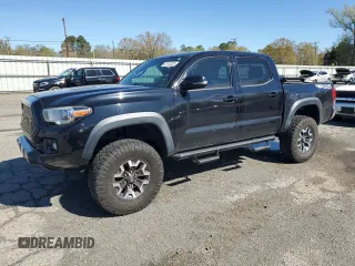 2016 Toyota Tacoma SR with VIN 5TFCZ5AN1GX005218, listed as a Copart auction lot 50140325 with 154,076 mi miles and Salvage Title. Bid and sale history available at carsss.com. Image 1.