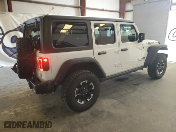 2025 Jeep Wrangler Rubicon with VIN 1C4RJXR65SW602574, listed as a Copart auction lot 66235235 with 3,151 mi miles and Clean title. Bid and sale history available at DreamBid. Image 3.