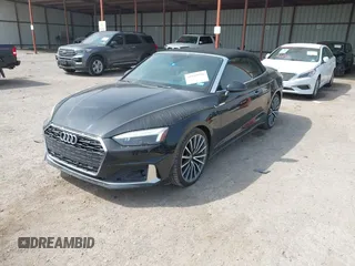 2020 Audi A5 Cabriolet Premium z VIN WAUWNGF50LN000334, wystawiony jako IAAI lot #41919556 z przebiegiem 56 494 mil mil oraz . Historia ofert i sprzedaży dostępna na DreamBid. Obrazek 2.
