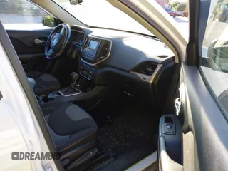 2016 Jeep Cherokee Sport with VIN 1C4PJMAB9GW143085, listed as a IAAI auction lot 42803158 with 268,076 mi miles and . Bid and sale history available at DreamBid. Image 5.