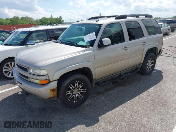 2005 Chevrolet Tahoe LT z VIN 1GNEK13T35R196103, wystawiony jako IAAI lot #42053184 z przebiegiem 326 536 mil mil oraz . Historia ofert i sprzedaży dostępna na DreamBid. Obrazek 2.