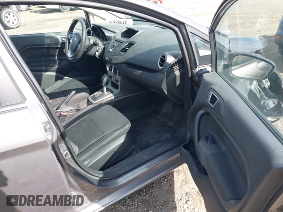 2014 Ford Fiesta SE with VIN 3FADP4BJ1EM199936, listed as a IAAI auction lot 41988670 with 44,846 mi miles and . Bid and sale history available at DreamBid. Image 5.