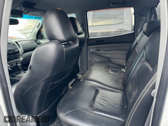 2013 Toyota Tacoma with VIN 5TFMU4FN5DX017891, listed as a Copart auction lot 50106805 with 136,651 mi miles and Salvage Title. Bid and sale history available at carsss.com. Image 6.