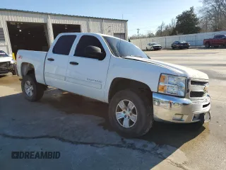 2013 Chevrolet Silverado 1500 LT with VIN 3GCPCSE04DG359394, listed as a Copart auction lot 48547555 with 214,435 mi miles and Salvage Title. Bid and sale history available at DreamBid. Image 4.