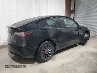 2022 Tesla Model Y Performance with VIN 7SAYGDEF3NF453267, listed as a Copart auction lot 53787615 with 82,452 mi miles and Salvage Title. Bid and sale history available at DreamBid. Image 3.