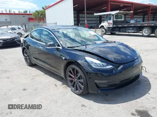 2020 Tesla Model 3 Performance z VIN 5YJ3E1EC5LF713103, wystawiony jako IAAI lot #42033230 z przebiegiem 49 383 mil mil oraz . Historia ofert i sprzedaży dostępna na DreamBid. Obrazek 1.