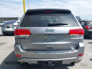 2014 Jeep Grand Cherokee Overland with VIN 1C4RJECG0EC291048, listed as a IAAI auction lot 41883941 with 81,871 mi miles. Bid and sale history available at carsss.com. Image 16.