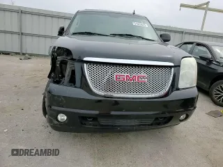 2009 GMC Yukon SLT 4SB with VIN 1GKFK33009R280856, listed as a Copart auction lot 51522635 with 265,941 mi miles and Salvage Title. Bid and sale history available at DreamBid. Image 12.