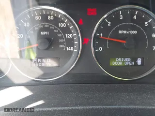2010 Jeep Grand Cherokee Laredo with VIN 1J4PS4GK6AC112447, listed as a IAAI auction lot 42086245 with 150,875 mi miles. Bid and sale history available at carsss.com. Image 7.