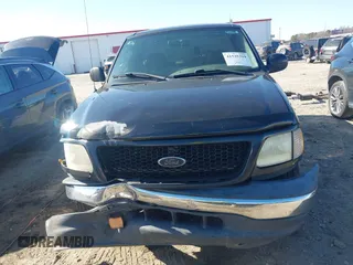 2003 Ford F-150 XL with VIN 1FTRF17223NA54202, listed as a IAAI auction lot 41535299 with Not Provided miles and . Bid and sale history available at DreamBid. Image 12.