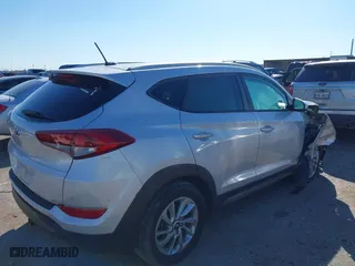 2016 Hyundai Tucson SE with VIN KM8J33A42GU238820, listed as a IAAI auction lot 41657093 with 47,319 mi miles. Bid and sale history available at carsss.com. Image 4.