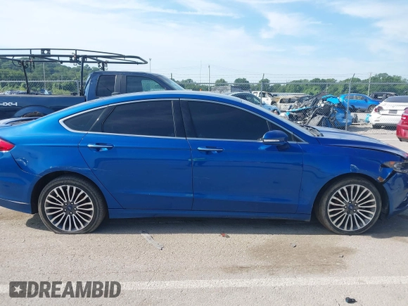 2018 Ford Fusion Titanium with VIN 3FA6P0D92JR205597, listed as a IAAI auction lot 42585935 with 146,072 mi miles and . Bid and sale history available at DreamBid. Image 13.