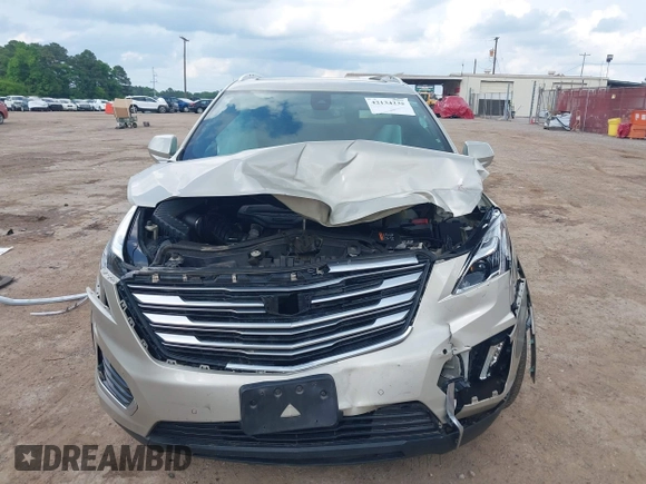 2017 Cadillac XT5 Premium Luxury FWD with VIN 1GYKNCRSXHZ193338, listed as a IAAI auction lot 42134235 with Not provided miles and . Bid and sale history available at DreamBid. Image 6.