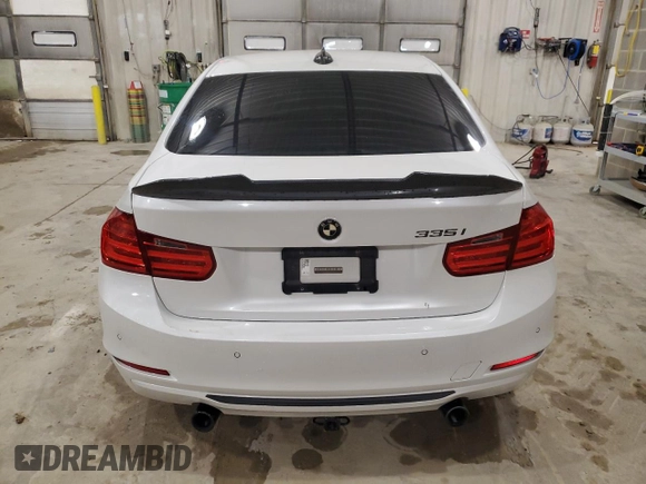 2013 BMW 3 Series 335i with VIN WBA3A9G51DNP36712, listed as a Copart auction lot 52407465 with 117,972 mi miles and Salvage title. Bid and sale history available at DreamBid. Image 6.