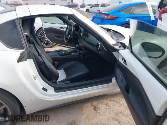 2021 Mazda MX-5 Miata Grand Touring with VIN JM1NDAM71M0454514, listed as a IAAI auction lot 41940252 with Not provided miles and . Bid and sale history available at DreamBid. Image 5.