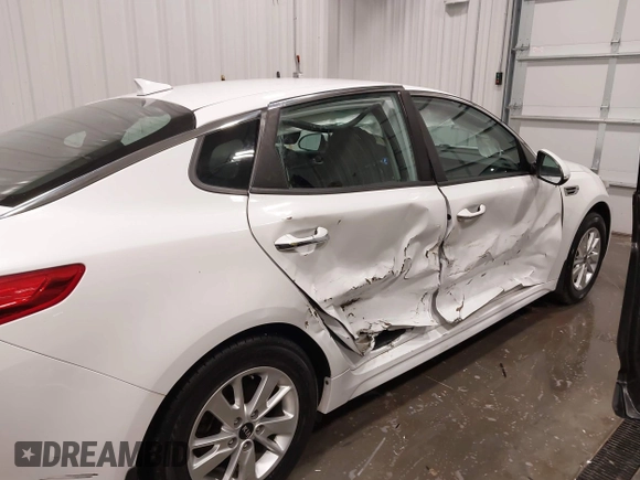 2016 Kia Optima LX with VIN 5XXGT4L38GG048180, listed as a IAAI auction lot 41923650 with 58,018 mi miles. Bid and sale history available at carsss.com. Image 6.