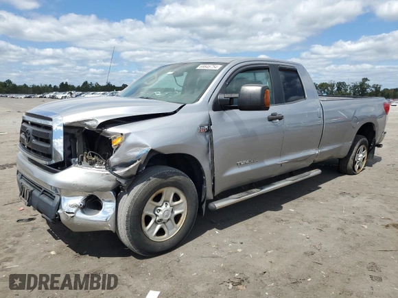2012 Toyota Tundra 4WD Truck with VIN 5TFCY5F15CX013941, listed as a Copart auction lot 69946754 with 163,228 mi miles and Salvage Title. Bid and sale history available at carsss.com. Image 1.