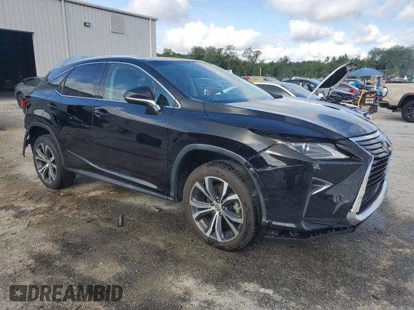 2016 Lexus RX 350 with VIN 2T2ZZMCA2GC008895, listed as a Copart auction lot 60194775 with 127,231 mi miles and Salvage title. Bid and sale history available at DreamBid. Image 4.