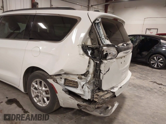 2021 Chrysler Voyager LXi with VIN 2C4RC1DG5MR508956, listed as a IAAI auction lot 41547647 with 104,563 mi miles and . Bid and sale history available at DreamBid. Image 6.