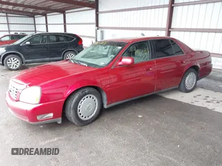 2004 Cadillac DeVille z VIN 1G6KD54Y14U144524, wystawiony jako IAAI lot #41960724 z przebiegiem Nie podano mil oraz . Historia ofert i sprzedaży dostępna na DreamBid. Obrazek 2.