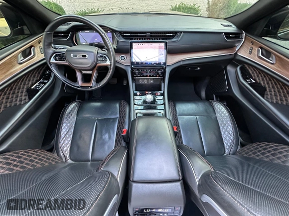 2023 Jeep Grand Cherokee Summit with VIN 1C4RJHEG2P8882566, listed as a Copart auction lot 65095905 with 59,970 mi miles and Salvage title. Bid and sale history available at DreamBid. Image 9.